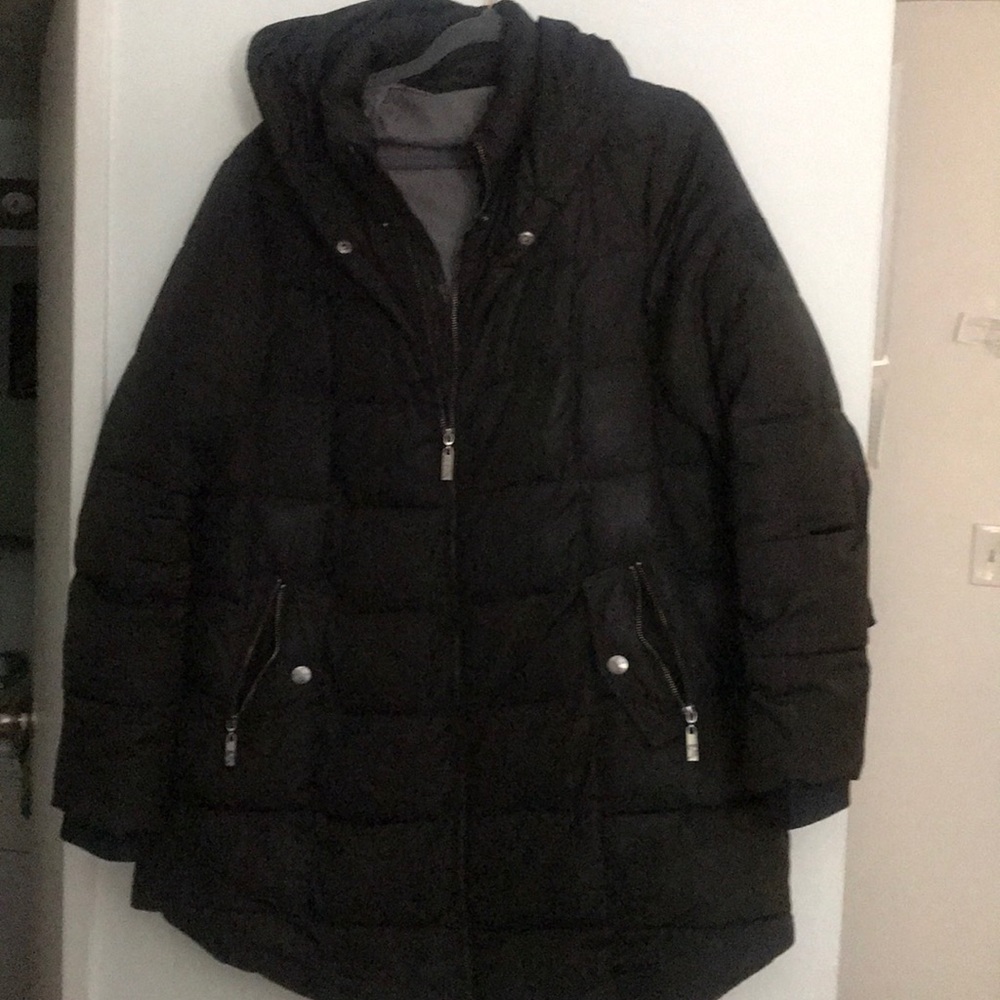 Red X outerwear fits like a 1X warm winter puffer